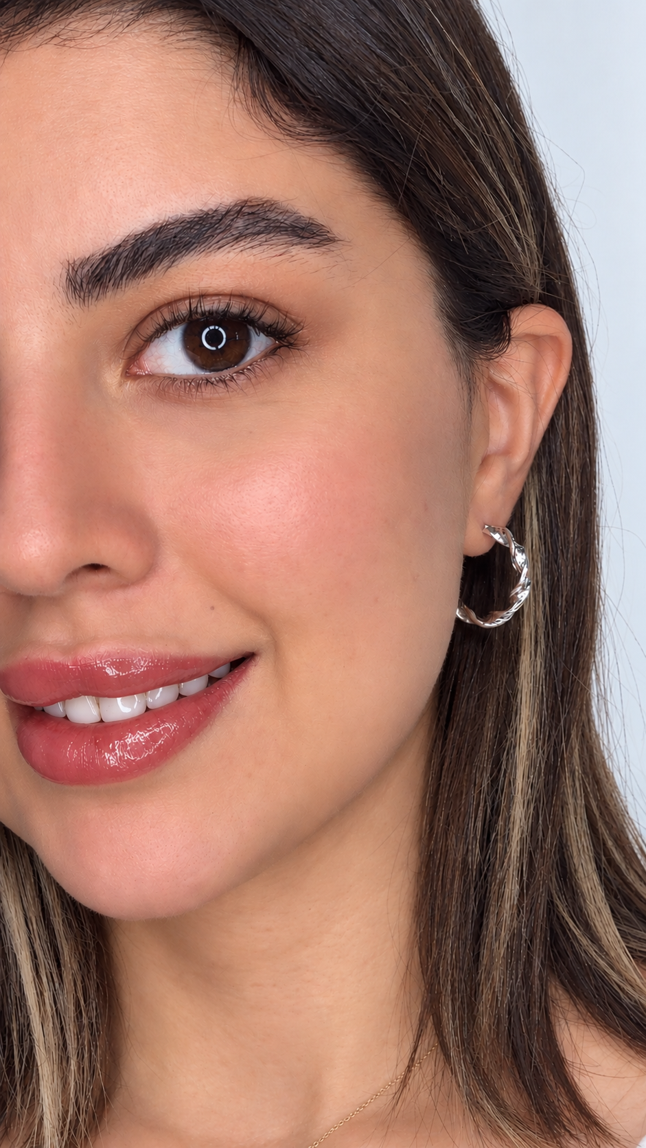 گوشواره حلقه‌ای پیچ نقره‌ای